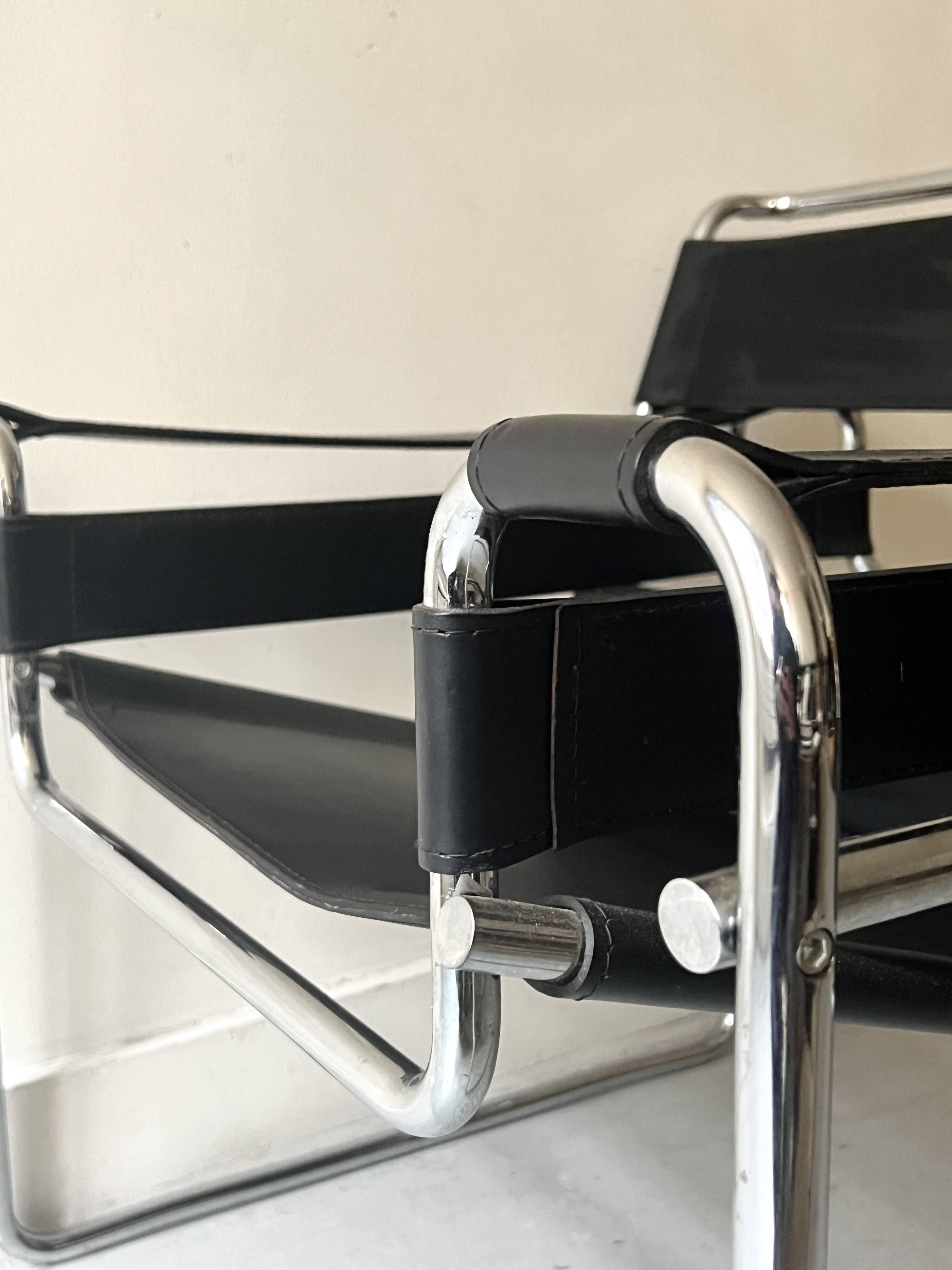 Wassily tubular armchair in chrome & black leather, designed by Marcel Breuer in 1970.