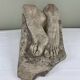 Stone sculpture, two feet on a block, signed D. Paillot.
