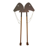 Wooden horses stick on wheels