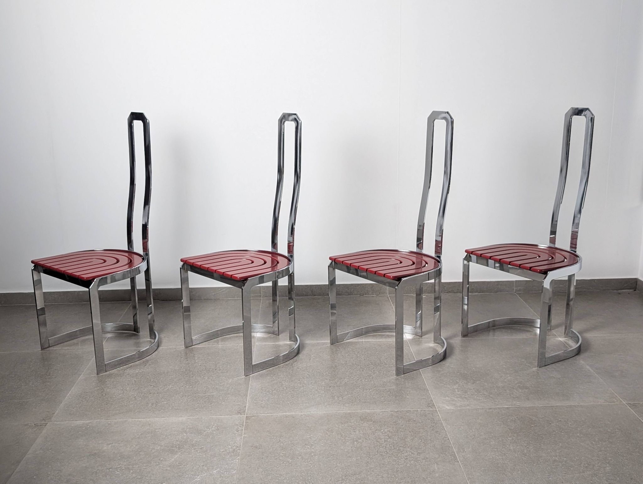 Postmodern chairs in chromed steel and red wood, set of 4, 1980s