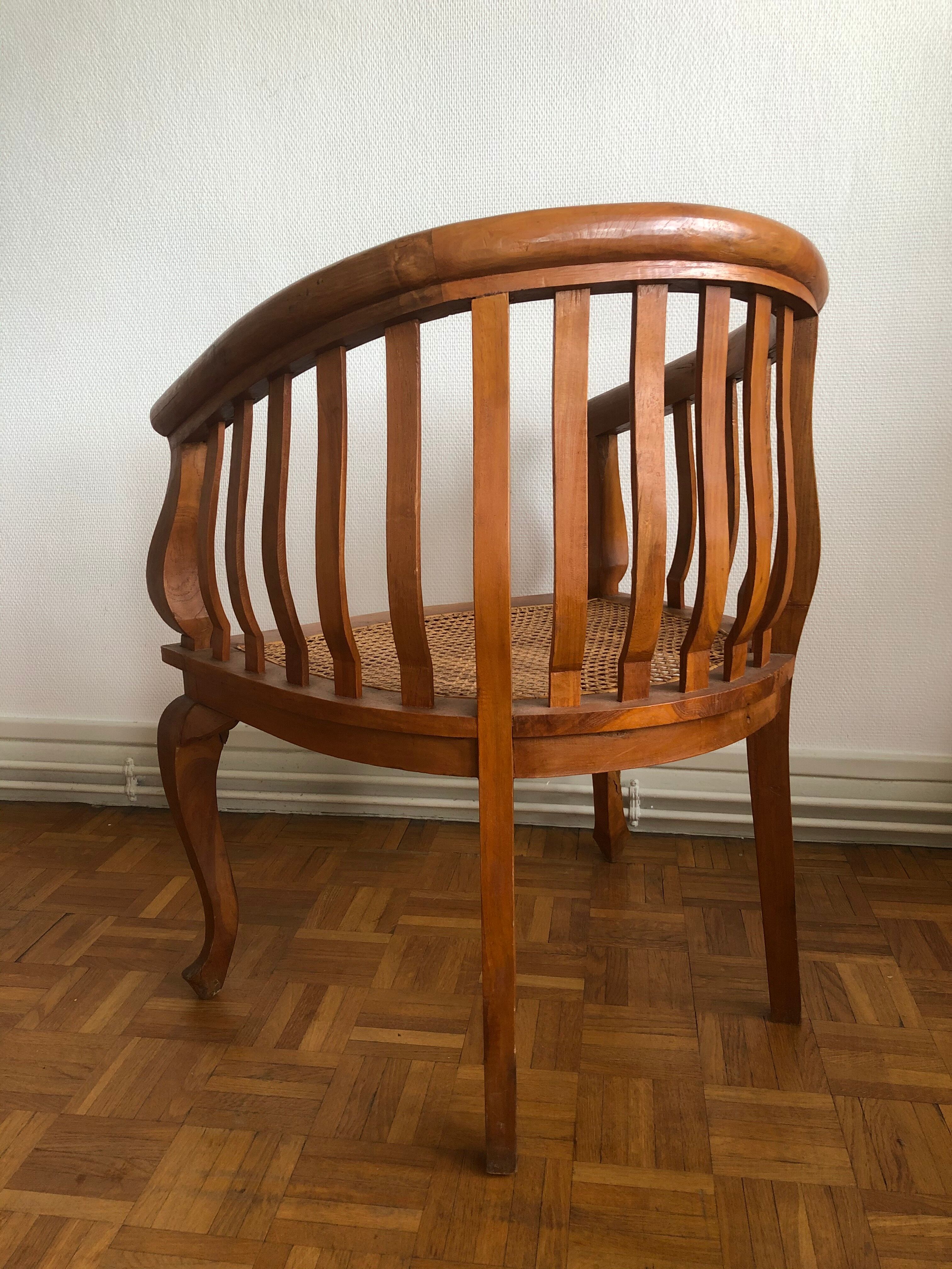 Exotic wooden canne colonial armchair