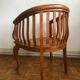 Fauteuil colonial canné en bois exotique