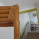 Storage column, wooden bookshelf and woven rattan.