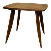 Coffee table with tapered legs