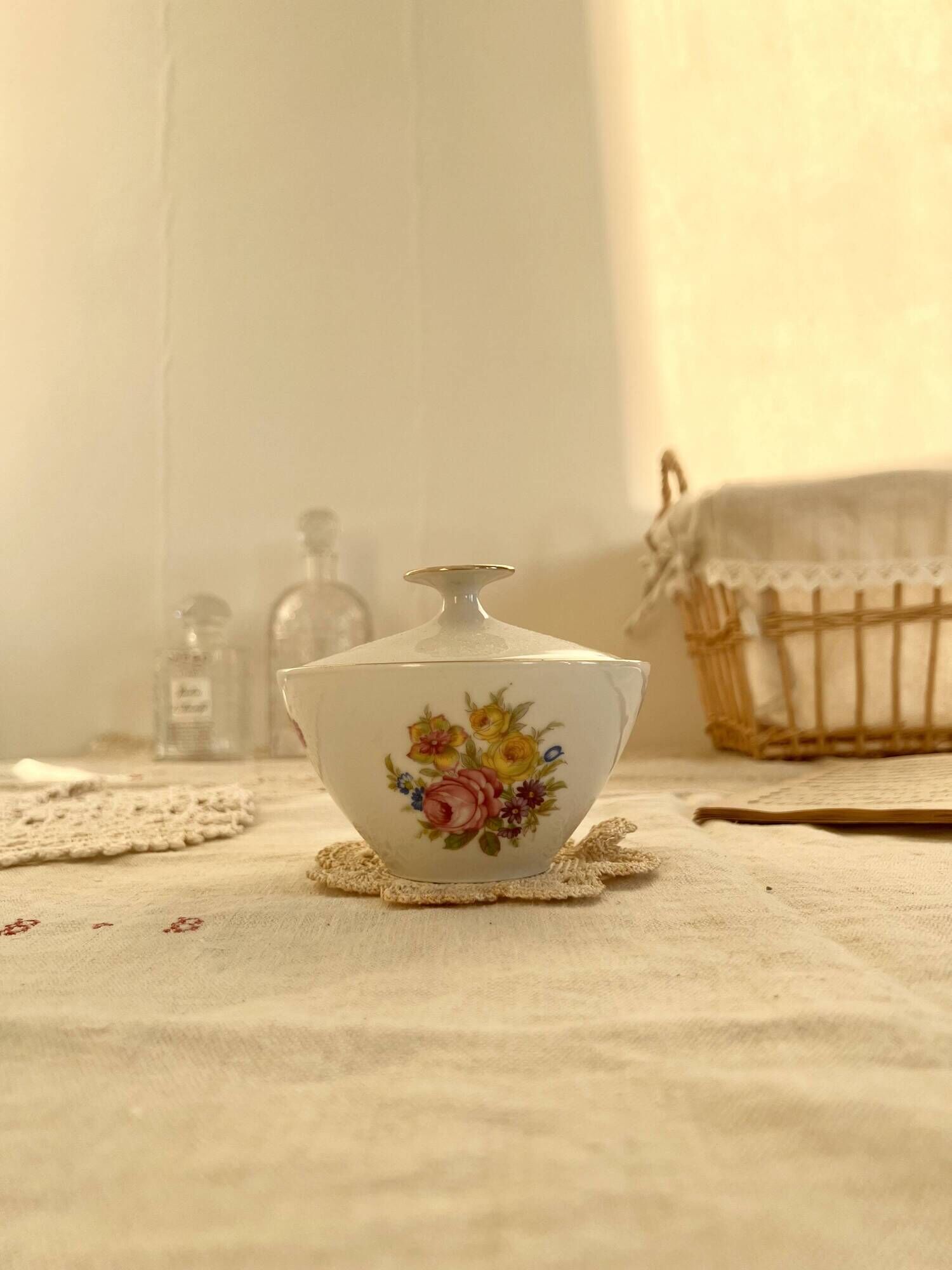 Vintage white porcelain sugar bowl and cottage core floral pattern