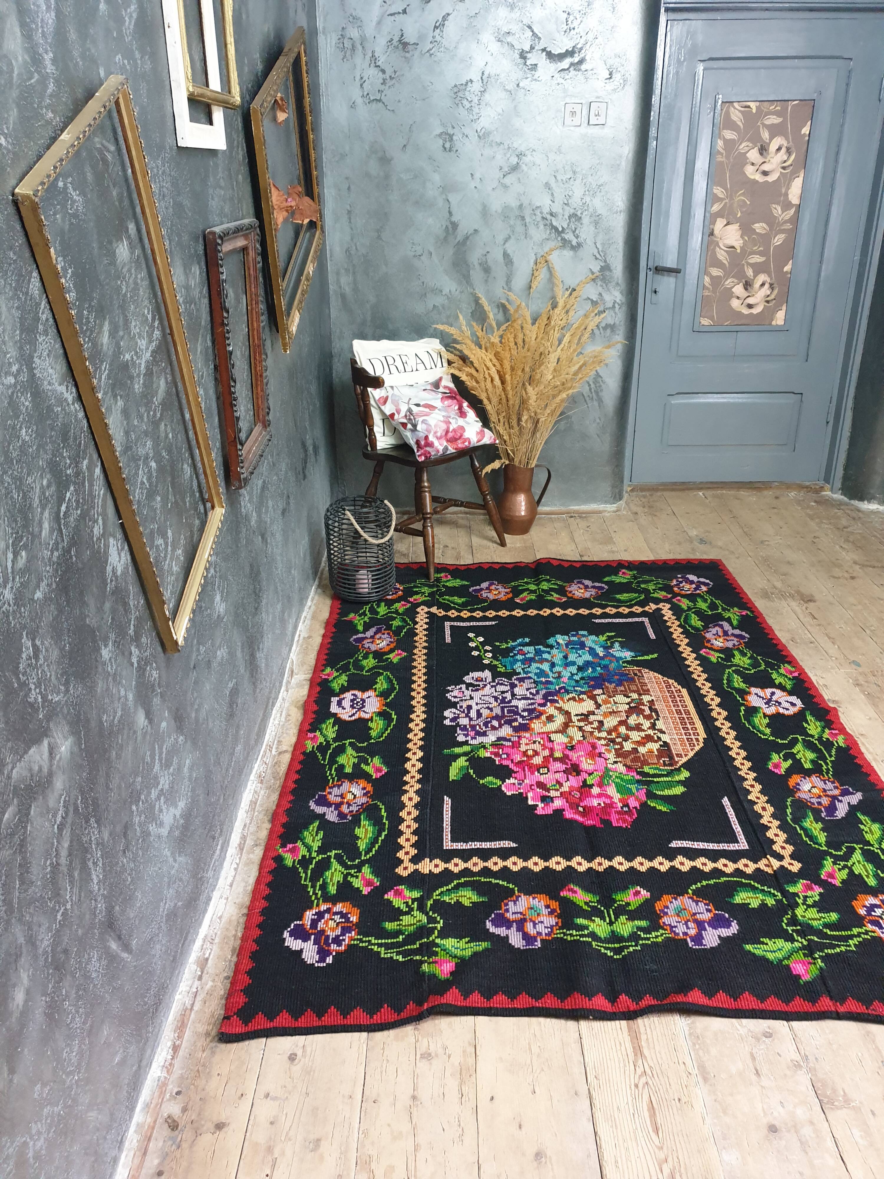 Vintage wool rug with floral design in sweet colors