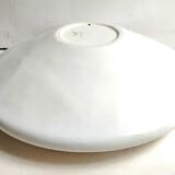 White resin planter in saucer shape - futuristic movement