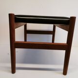 Danish designed footstool, in teak and black skai. Made at Spøttrup furniture factory in the 1960s.