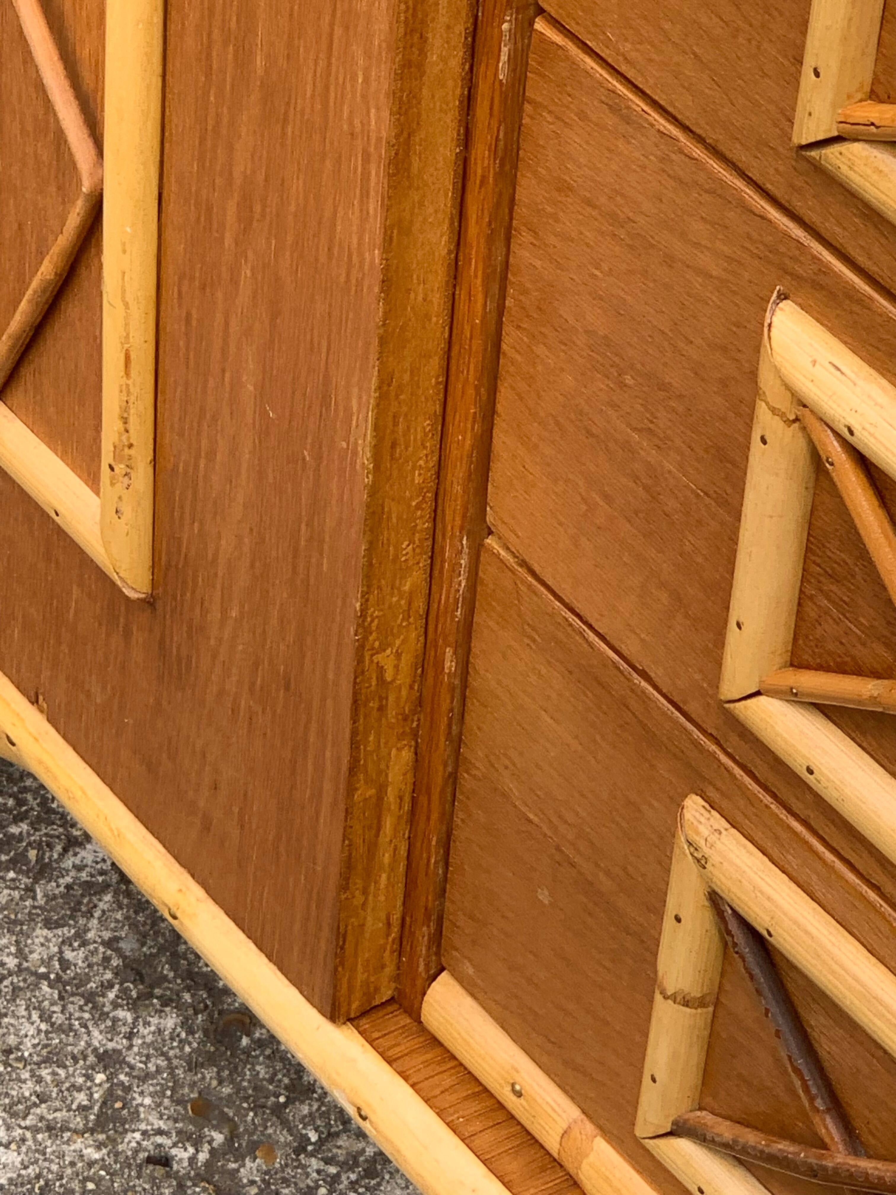 Rattan wardrobe with tapered legs from the 1960s.