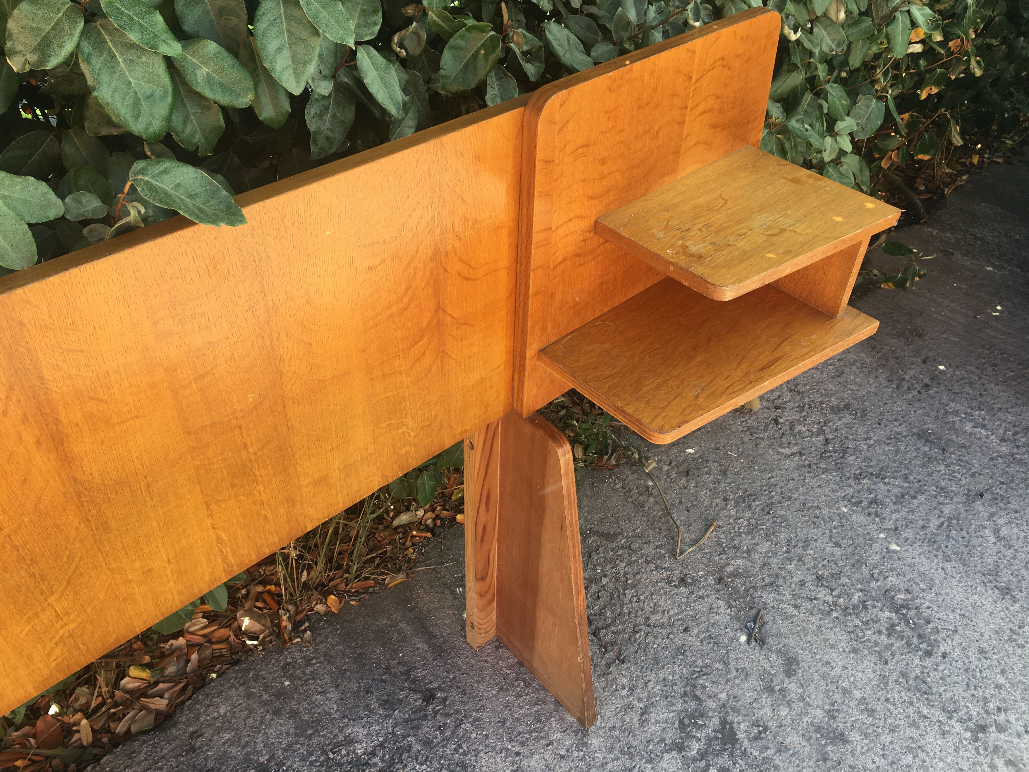 Vintage headboard with hanging bedside tables