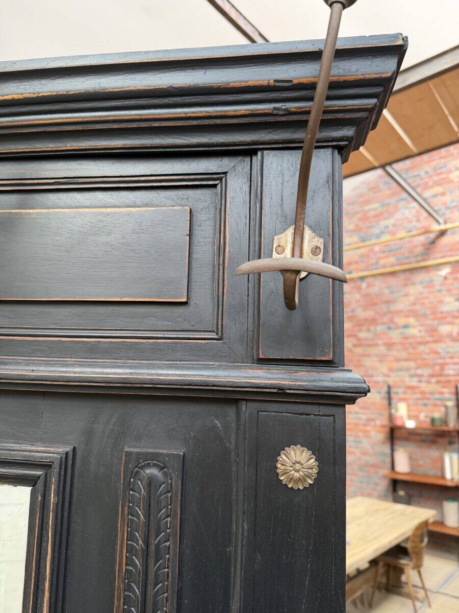Patinated oak wardrobe from the early 20th century.