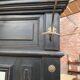 Patinated oak wardrobe from the early 20th century.