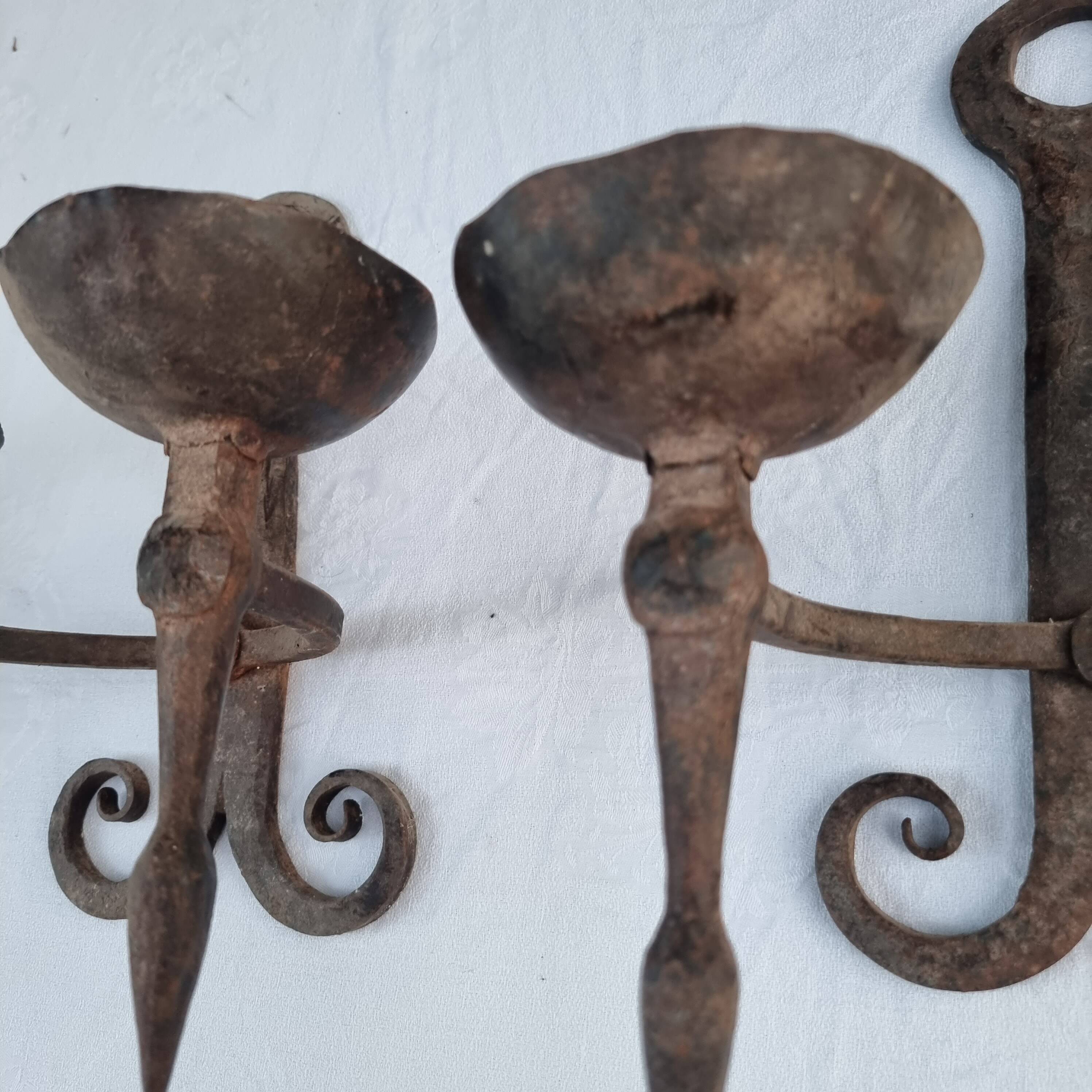 Pair of antique 15th century medieval castle wrought iron candlesticks