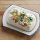 Large vintage faience butter dish with slip decoration – Fruit design