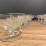 Suite of 12 champagne glasses in cut glass with floral decoration