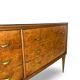 Veneered burl walnut chest of drawers with light warm brown glass top