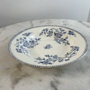 Hollow plate in ironstone from Terre de Feu of Grigny with floral decoration bl