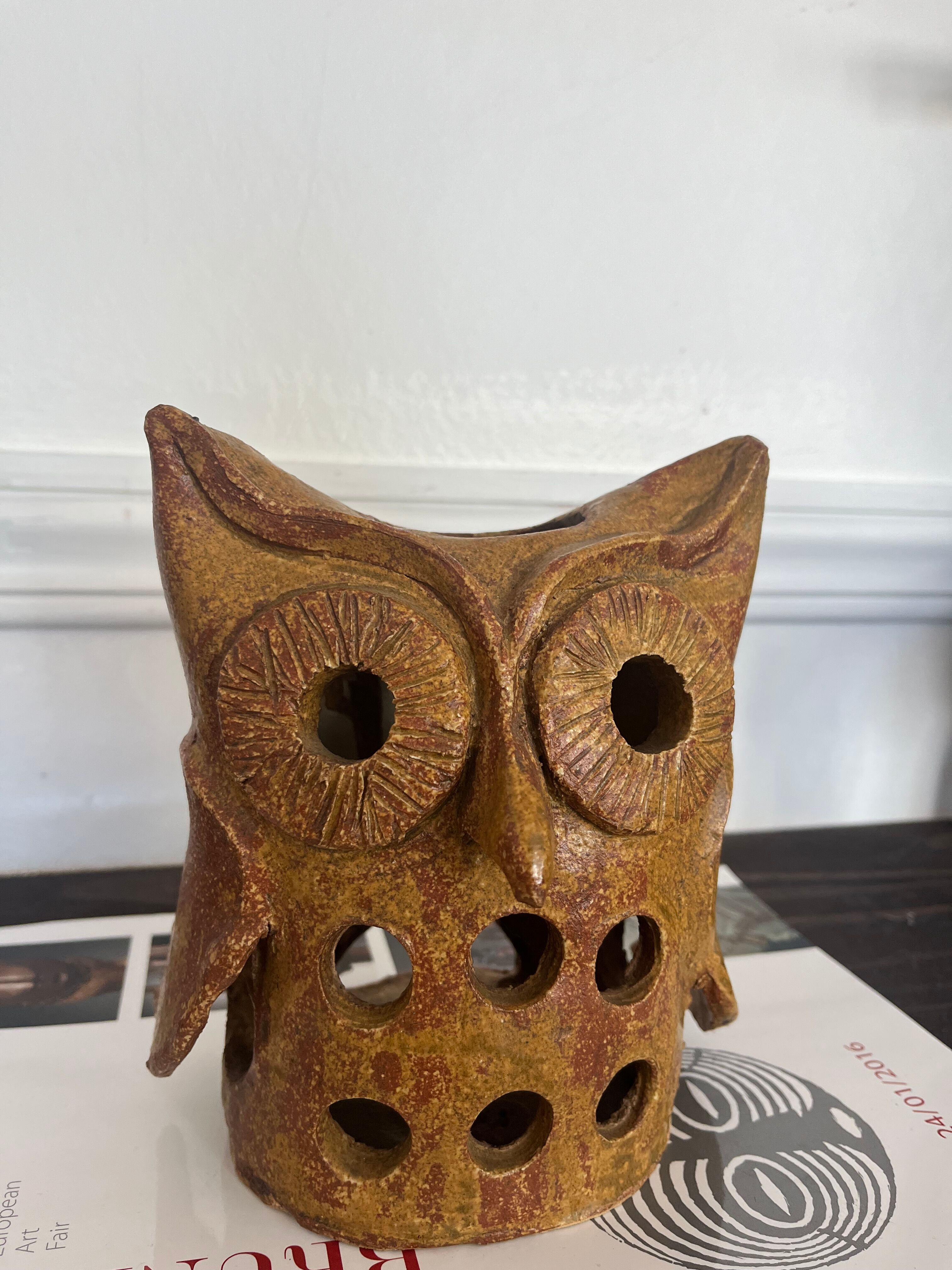 Stoneware lantern in the shape of an owl.
