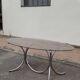 Vintage oval design table in smoked glass and chrome legs
