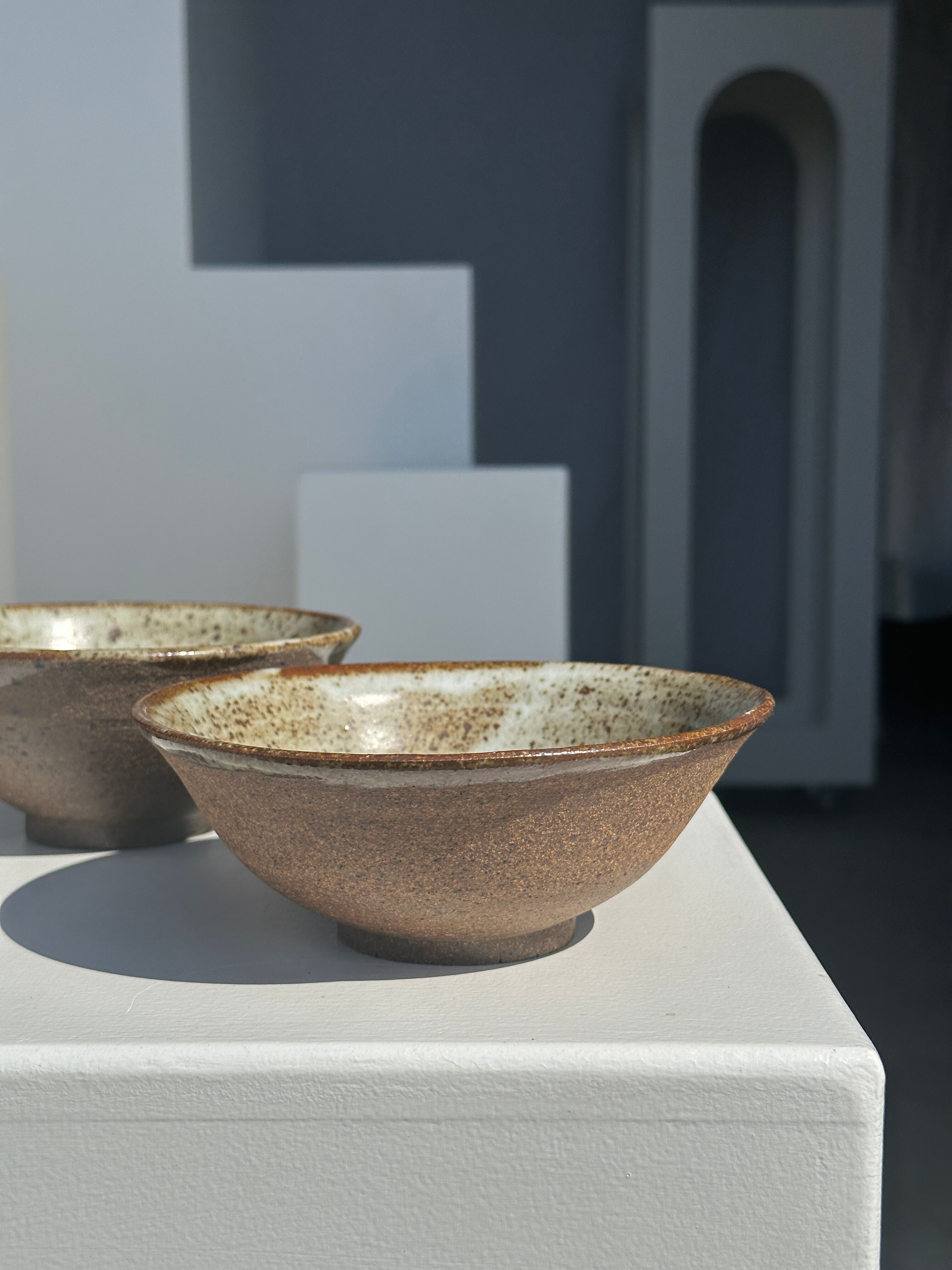 Duo of ceramic bowls interior glazed exterior matt raw earth