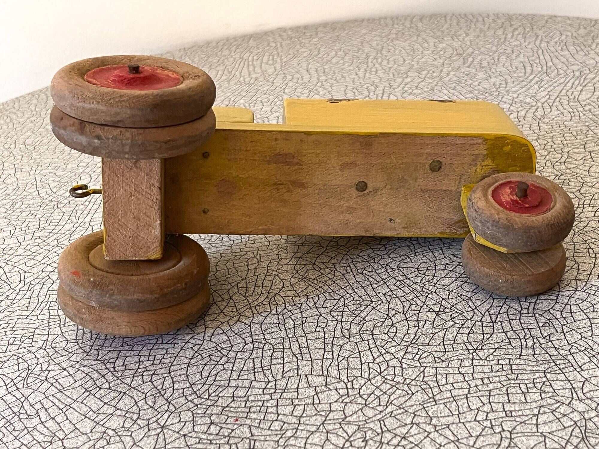 Wooden tractor from the French brand "Ateliers du Père Noël"