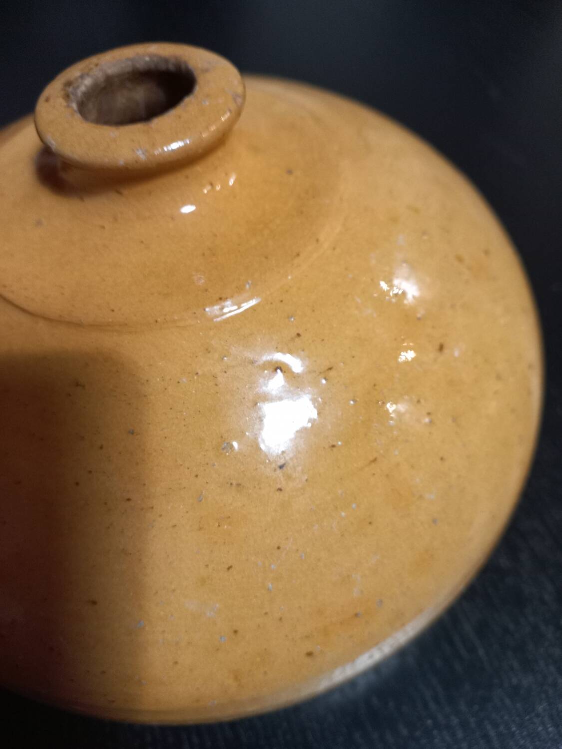 Old enameled terracotta hot water bottle