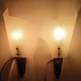 Pair of copper and plexiglass torch wall lights from the 1960s