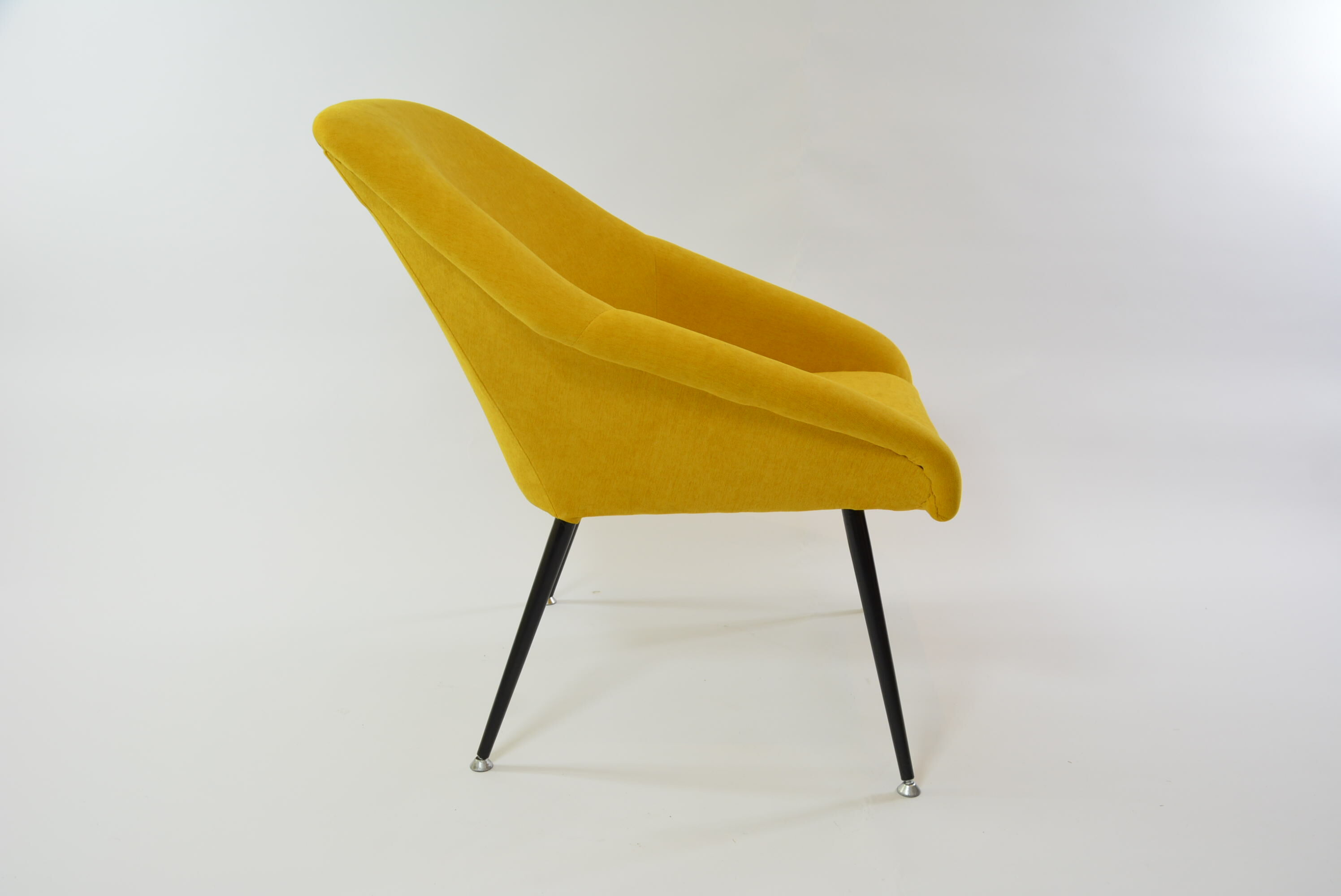 Yellow shell armchair