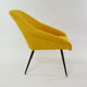 Yellow shell armchair