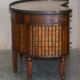 Regency style hardwood and leather kidney desk with gallery.
