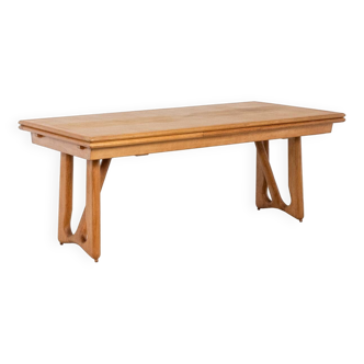 Guillerme et Chambron. Table en chêne naturel. Années 1970.