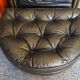 Chesterfield style leather armchair & footstool by Hancock & Moore