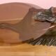 Coffee table, young woman in resin, smoked and beveled glass