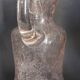 Small blown glass pitcher with bubbles from the 20th century.
