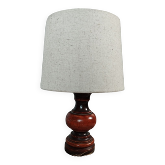 Bedside lamp with turned varnished wooden base, ecru lampshade, 1970