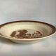 Earthenware plate from Moulin des Loups with stencil pattern.
