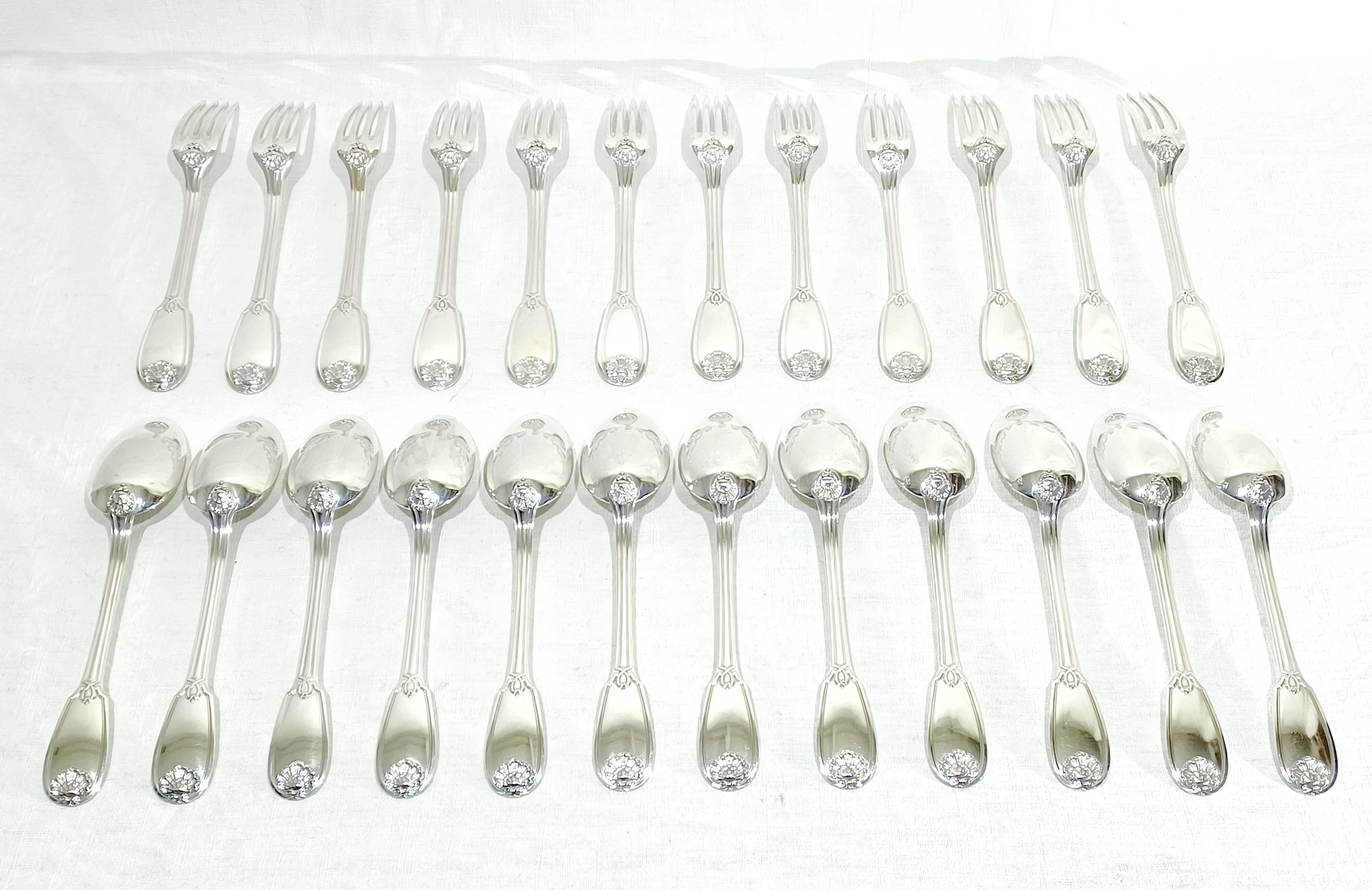 12 Louis XIV style silver cutlery sets