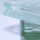 Two designer glass paving pockets