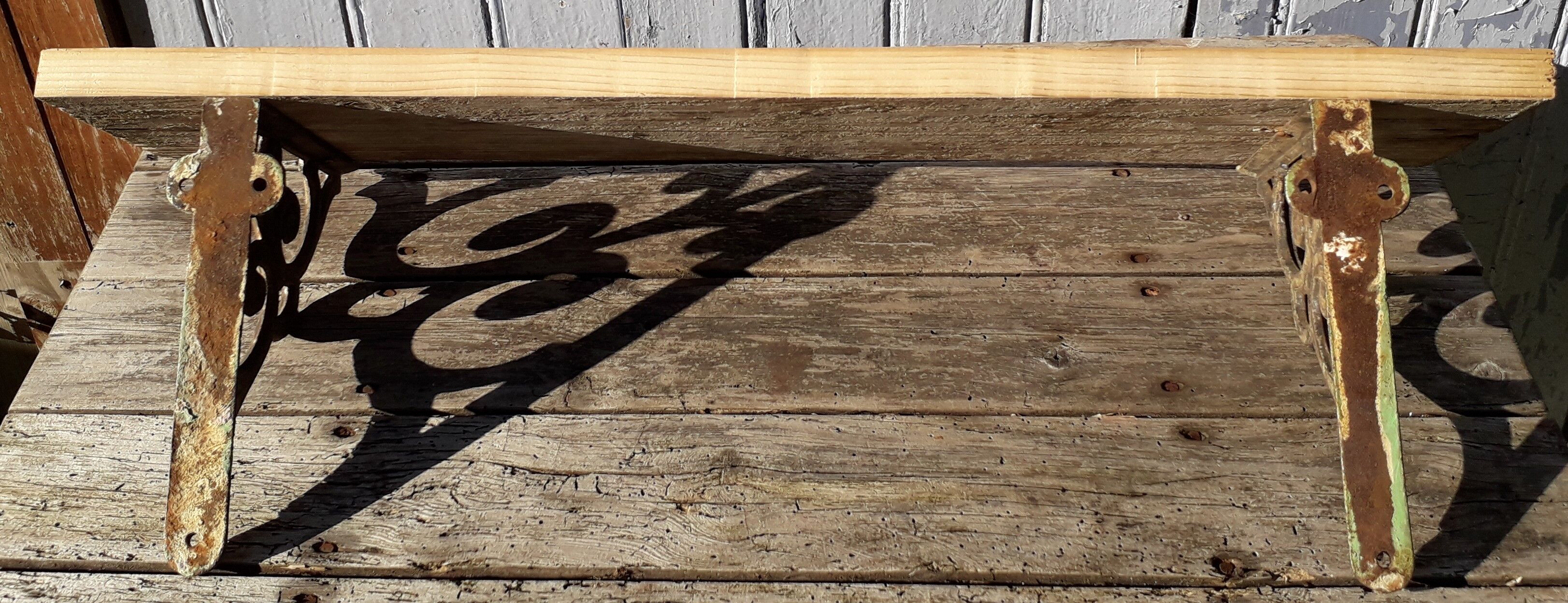 Wooden shelf and cast iron