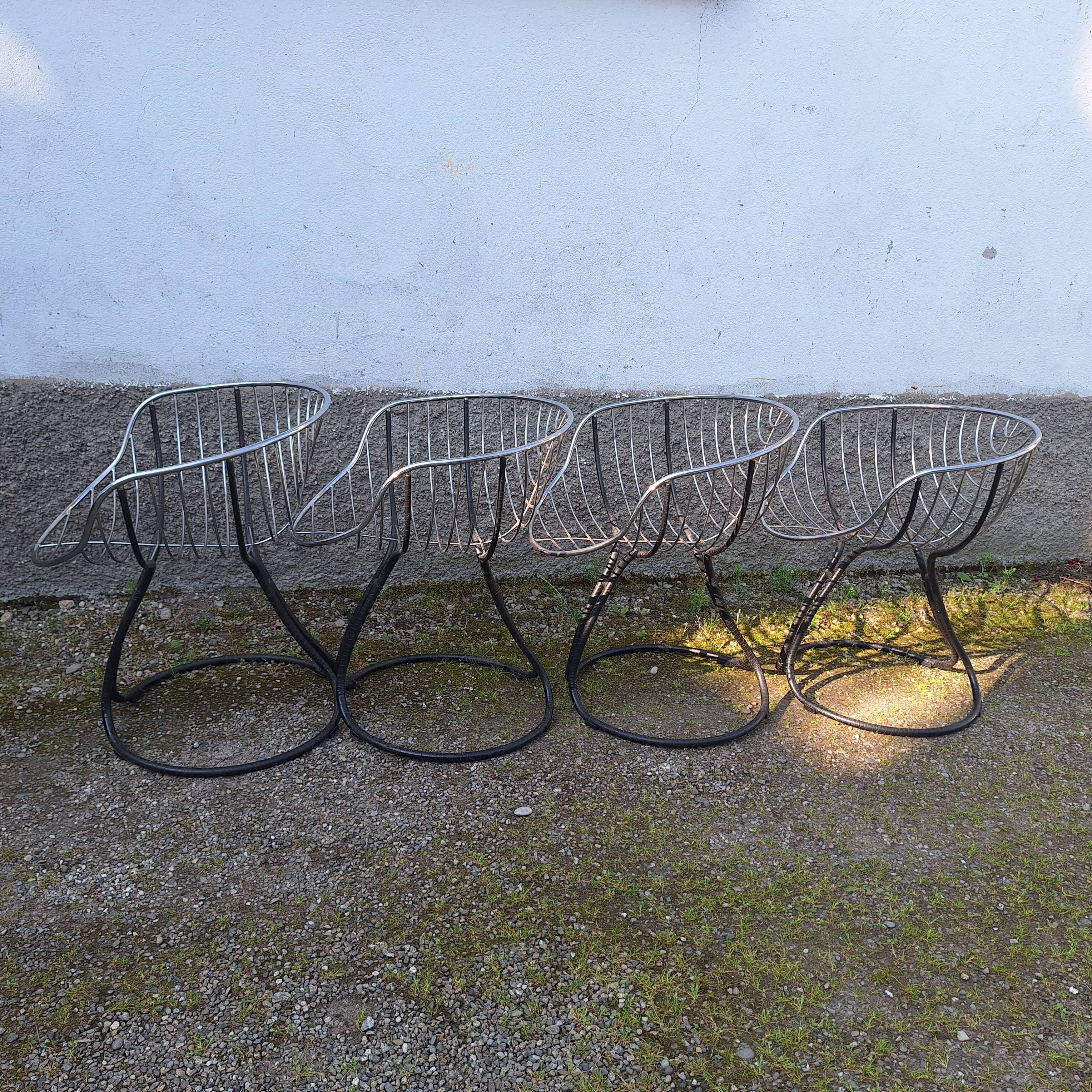 Series of 4 "Pan Am" armchairs