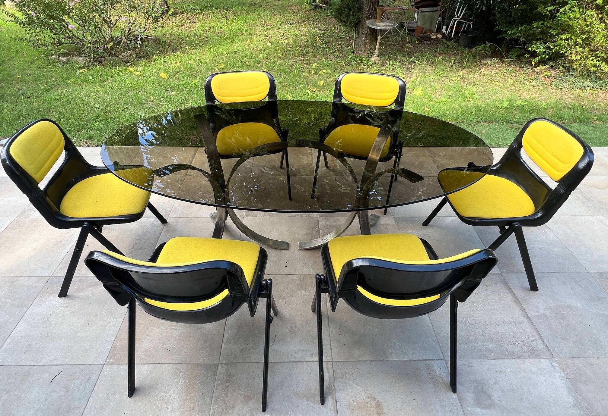 Oval dining table 1960-1970 smoked glass top and chrome base