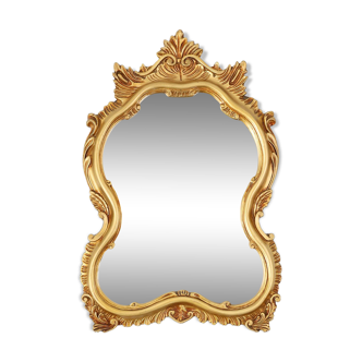 20th Century Baroque gilded shaped oval mirror, France