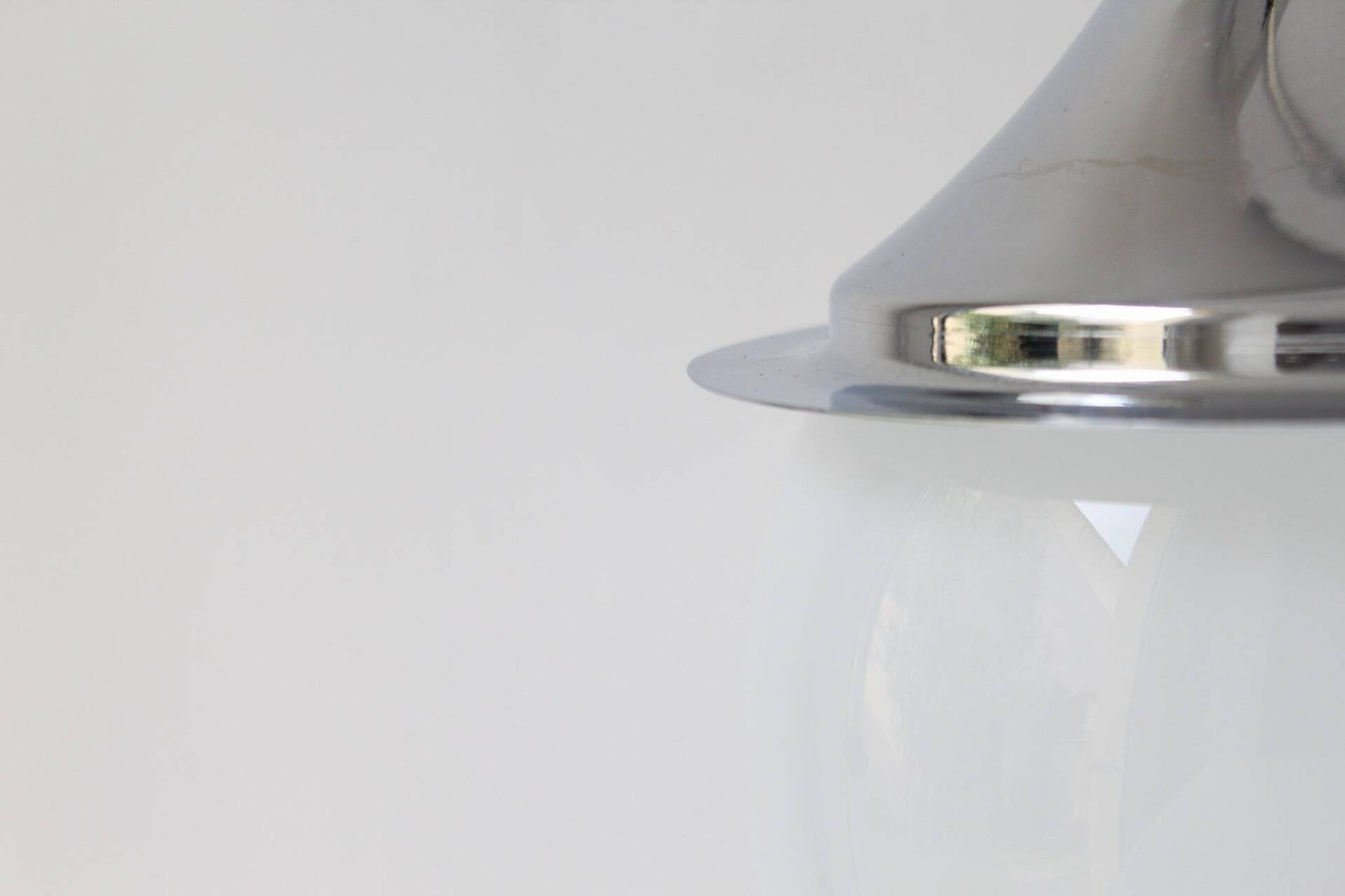 Space age glass and chrome ball suspension