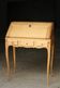 Sloped wooden desk in light wood, ideal for remote work. Secret drawer.