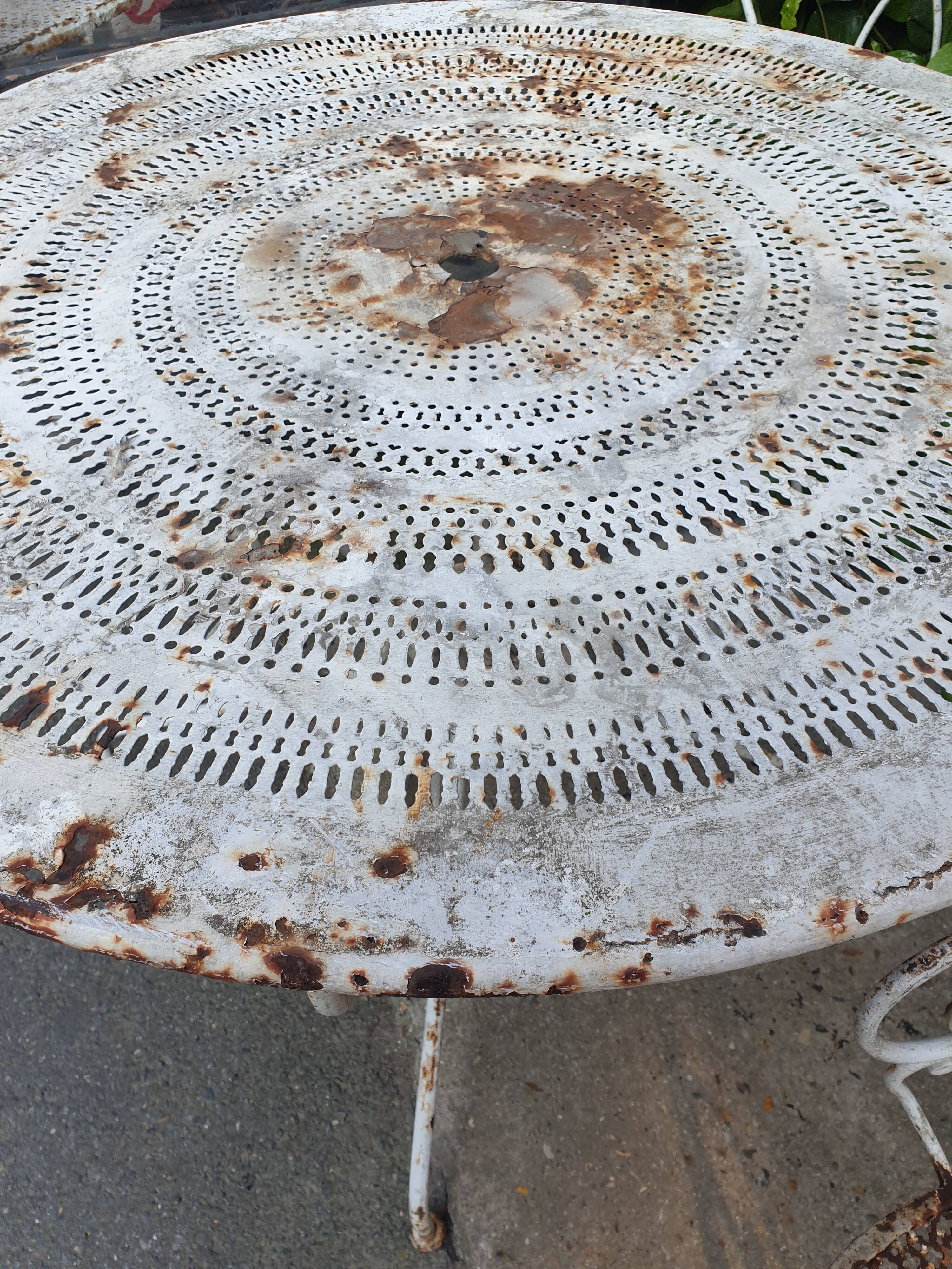 Old wrought iron garden table
