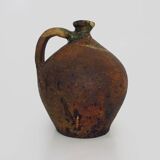 Old goat, jug, gargoulette, water pitcher in glazed green sandstone. nineteenth century