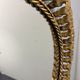 Midcentury bohemian Hollywood Regency Spanish gilt metal sun mirror, 1960s