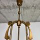 Art Nouveau chandelier with three arms and opalescent iridescent glass.
