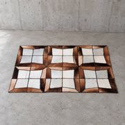 Tapis en patchwork de cuir de vache à lacets / années 1980