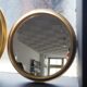Suite of three brass mirrors